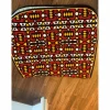 Ensemble composé d’un tapis, d’un bonnet et d’un sac de pansage