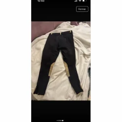 Pantalon noir et beige